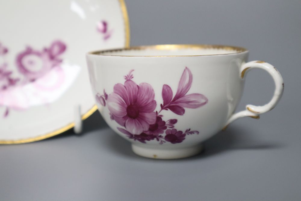 A Vienna puce en camaieu cup and trembleuse saucer, diameter 13.5cm (repair) and a similar Furstenburg cup and saucer, late 18th centur